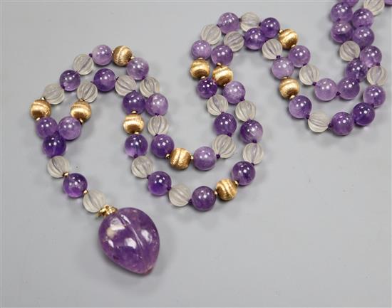Kai-Yin Lo, Hong Kong, an amethyst, reeded glass and 14k bead necklace with carved fruit pendant,